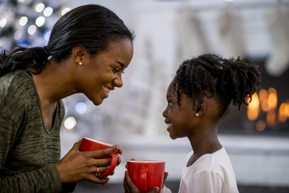 Mother and daughter drinking hot chocolate 