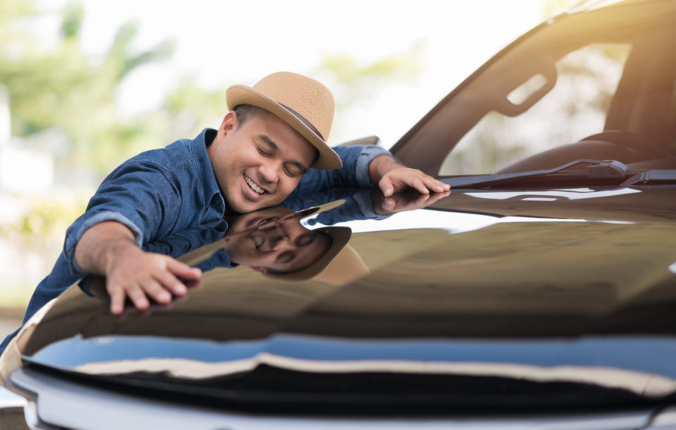 happy man buying a car